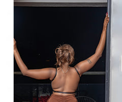 Black bridal bra styled with an evening outfit