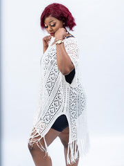 White crochet swim cover up for women with fringe detailing over swimsuit
