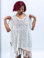 White crochet swim cover up for women with fringe detailing over swimsuit